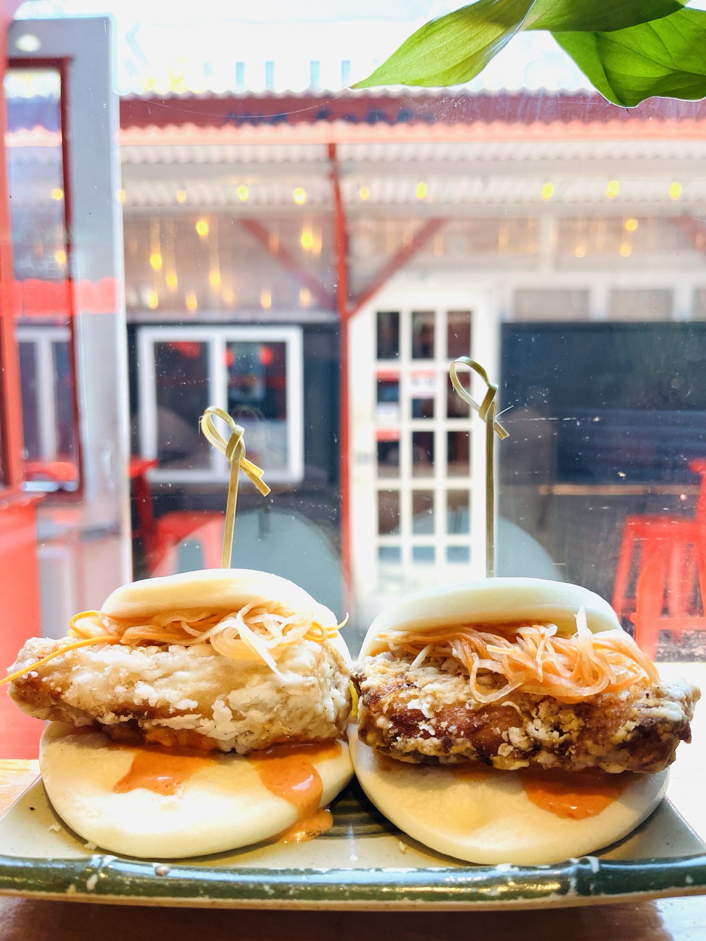 Karaage Bun filled with crispy Japanese fried chicken and chili mayo