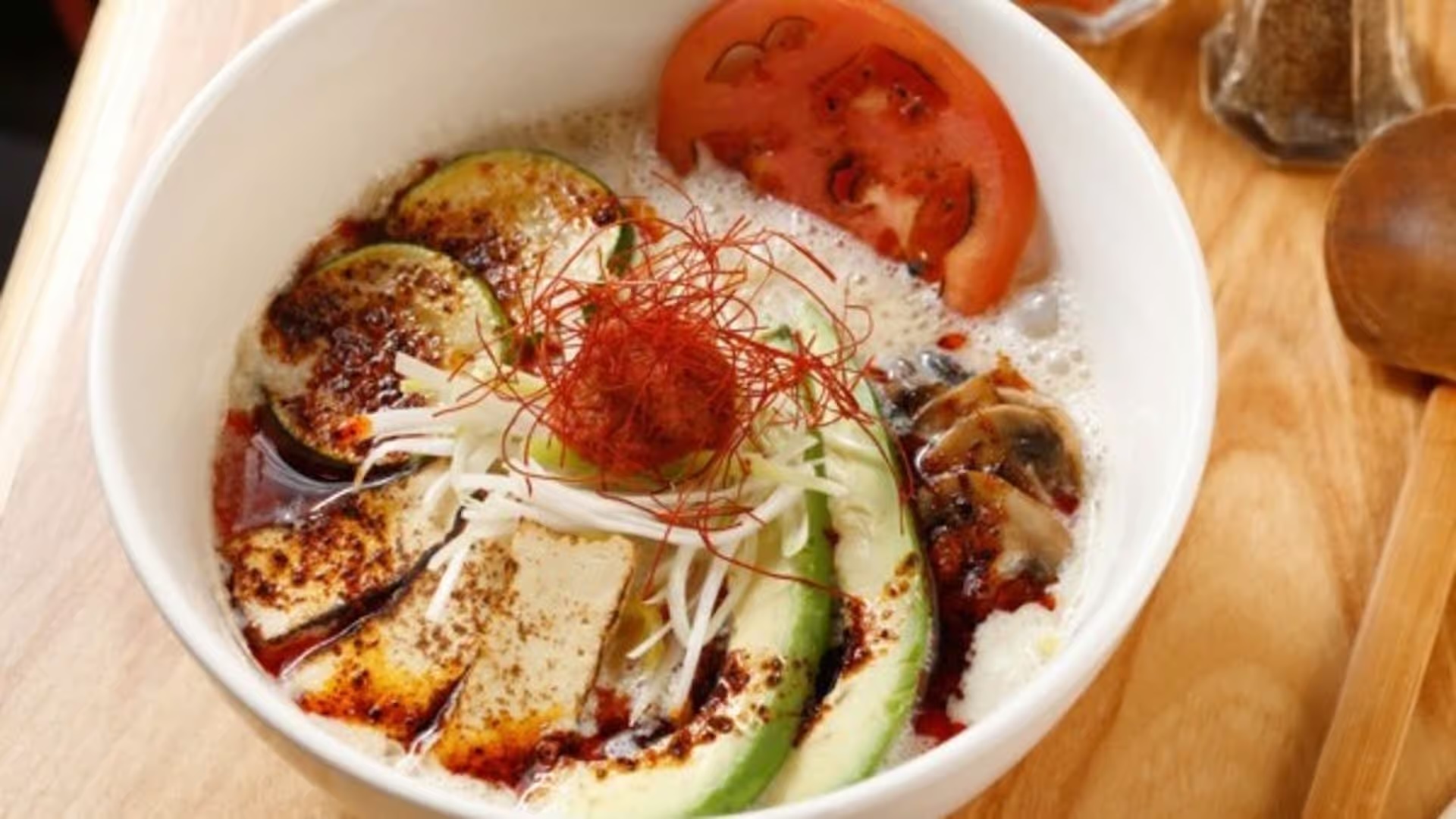 Taka's Vegan ramen with avocado, zucchini, and tofu